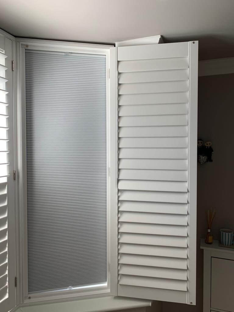 White Shutter with Blackout Blind in Brentwood