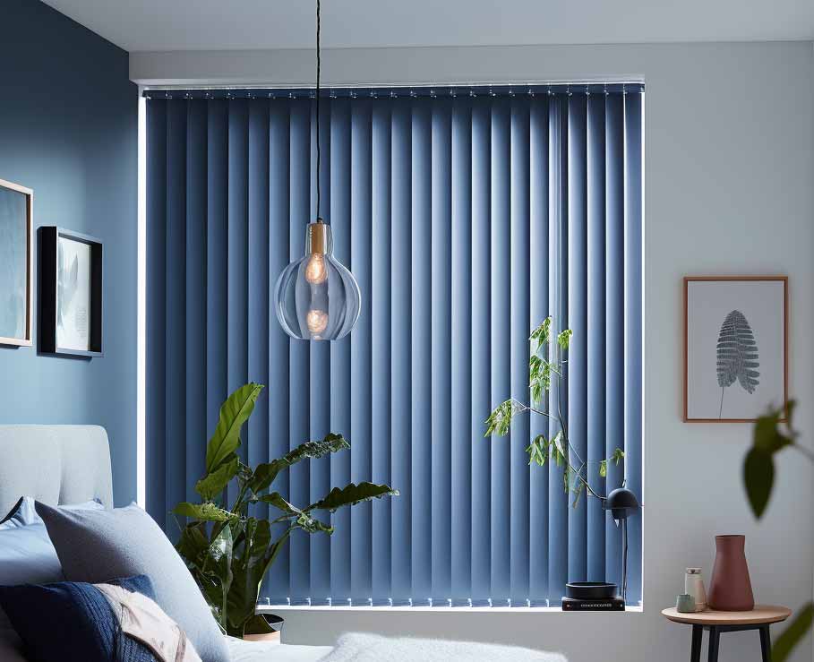 Blue Vertical Blinds In A Bedroom